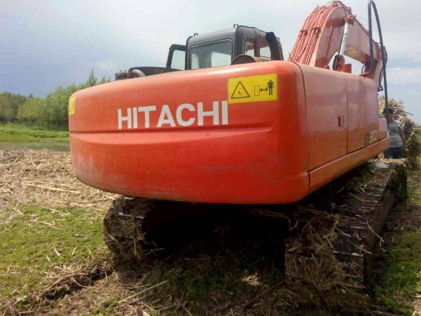 Hitachi ZAXIS120 excavator हळू चालत असल्याचे निदान कसे करावे?